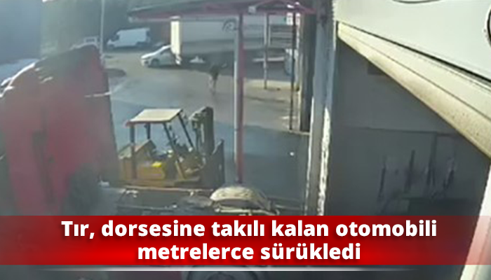 Tır, dorsesine takılı kalan otomobili metrelerce sürükledi