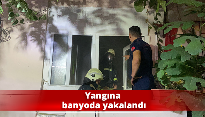 Yangına banyoda yakalandı